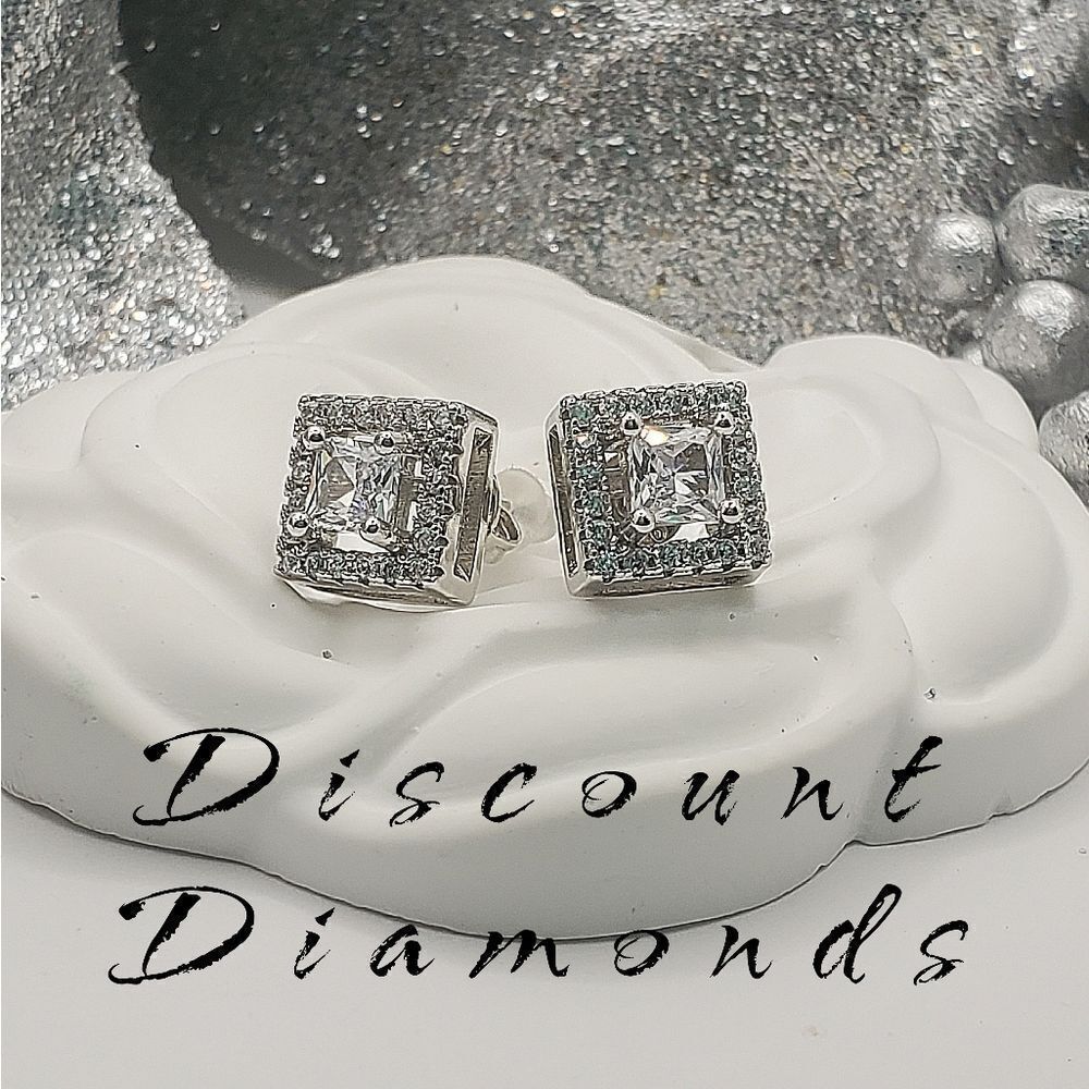 Clear White Moissanite surrounded by smaller Moissanite on 925 Sterling Silver